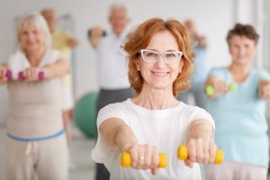 A women exercising with eyeglasses wearing